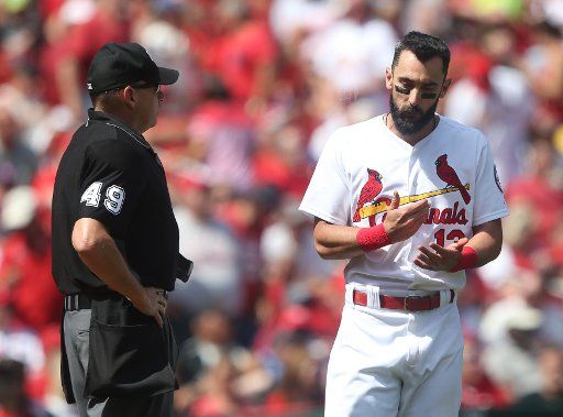 St. Louis Cardinals Matt Carpenter atgues balls and strikes with home plate umpire Andy Fletcher in the fifth inning against the Pittsburgh Pirates at Busch Stadium in St. Louis on September 12, 2018. Pittsburgh defeated St. Louis 4-3. Photo by Bill Greenblatt\/