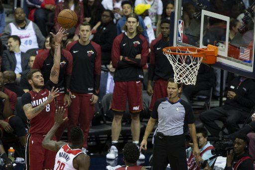 Miami Heat guard Tyler Johnson (8) shoots during the game between the Miami Heat and Washington Wizards on October 18, 2018 at Capitol One Arena in Washington, DC. Photo by Alex Edelman\/