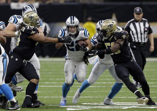 Carolina Panthers running back Christian McCaffrey (22) goes for 7 yards against the New Orleans Saints in the first quarter at the Mercedes-Benz Superdome in New Orleans December 30, 2018. Photo by AJ Sisco\/UPI.
