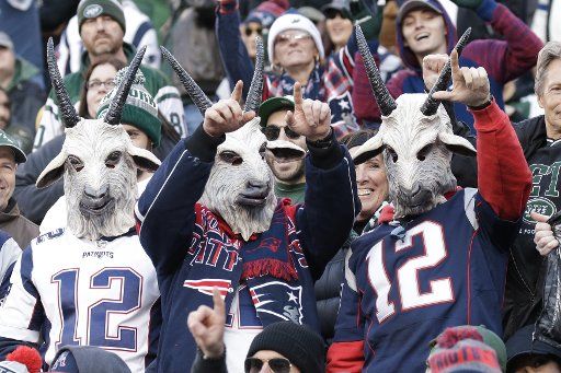 Fans wearing New England Patriots quarterback Tom Brady\