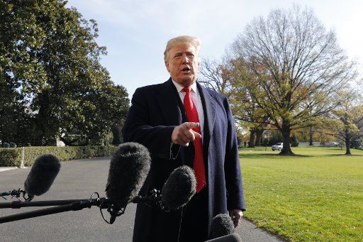 U.S. President Donald Trump talks to the media on the South Lawn of the White House in Washington on November 29, 2018 before his departure for the G20 leaders summit in Buenos Aires, Argentina. Photo by Yuri Gripas\/