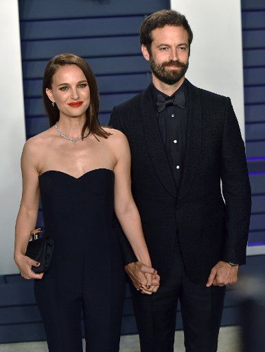 Natalie Portman (L) and her husband Benjamin Millepied arrive for the Vanity Fair Oscar Party at the Wallis Annenberg Center for the Performing Arts in Beverly Hills, California on February 24, 2019. Photo by Christine Chew\/