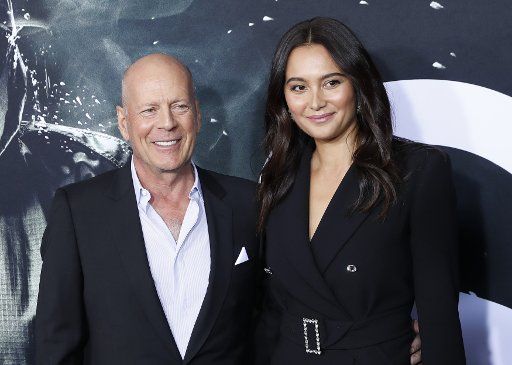 Bruce Willis and Emma Heming arrive on the red carpet at the \