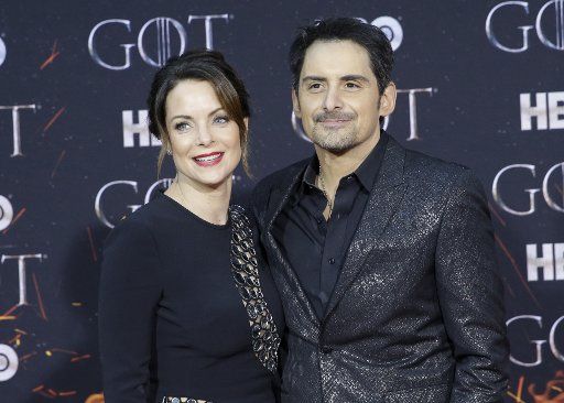 Brad Paisley and Kimberly Williams Paisley arrive on the red carpet at the Season 8 premiere of \