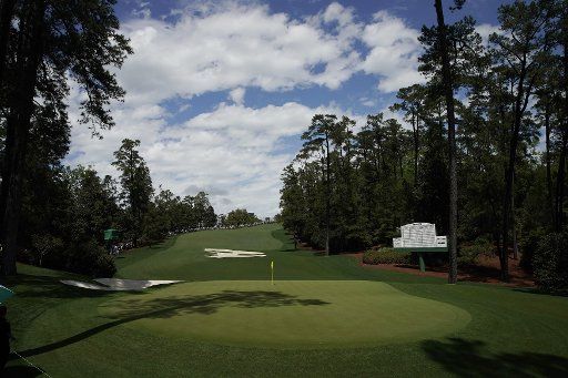 Shadows fall on the 10th green at practice on the Tuesday before the 2019 Masters Tournament at Augusta National Golf Club in Augusta, Georgia, on April 9, 2019. Photo by John Angelillo\/