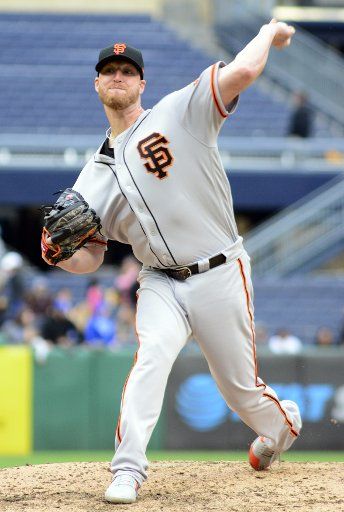 San Francisco Giants relief pitcher Will Smith (13) throws in the ninth inning of the Giants 3-2 win against the Pittsburgh Pirates and records his fifth save at PNC Park on April 21, 2019 in Pittsburgh. Photo by Archie Carpenter\/