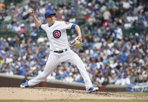 Chicago Cubs relief pitcher Brad Brach delivers against the Los Angeles Dodgers in the sixth inning at Wrigley Field on April 25, 2019 in Chicago. Photo by Kamil Krzaczynski\/