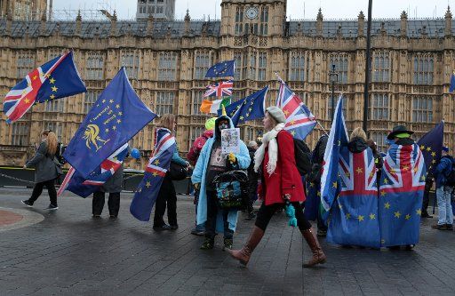 Pro and Anti-Brexit protestors campaign outside the Houses of Parliament ahead of the crucial Brexit vote that will determine the Uks Political and Economic future,on March 12, 2019. Photo by Hugo Philpott\/