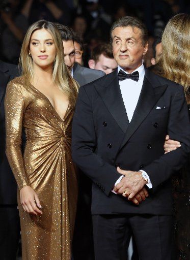 Sylvester Stallone and his daughter Sophia Stallone arrive on the red carpet before the screening of the film "Rambo: First Blood" at the 72nd annual Cannes International Film Festival in Cannes, France on May 24, 2019. Photo by David Silpa\/