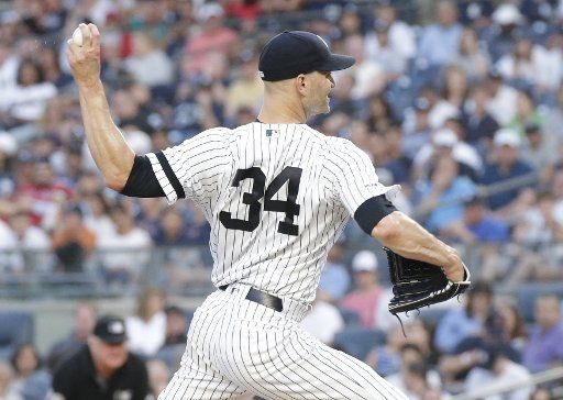 New York Yankees starting pitcher J. A. Happ throws a pitch in the 2nd inning against the Boston Red Sox at Yankee Stadium in New York City on May 31, 2019. Photo by John Angelillo\/