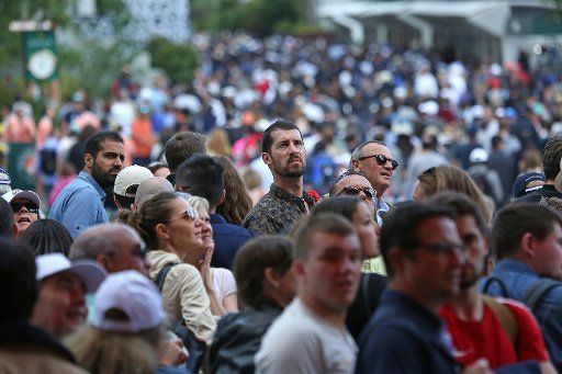 The crowd moves between courts during the French Open at Roland Garros in Paris on June 6, 2019. Photo by David Silpa\/