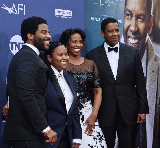 Honoree Denzel Washington (R) attends the 47th annual AFI Life Achievement Award tribute gala with his son Malcolm Washington, daughter Katia Washington and wife Pauletta Washington (L-R) at the Dolby Theatre in the Hollywood section of Los Angeles on June 6, 2019. Photo by Jim Ruymen\/