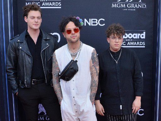 (L-R) Jordan Greenwald, Mitchy Collins, and Sam Price of lovelytheband arrive for the 2019 Billboard Music Awards at the MGM Grand Garden Arena in Las Vegas, Nevada on May 1, 2019. Photo by Jim Ruymen\/