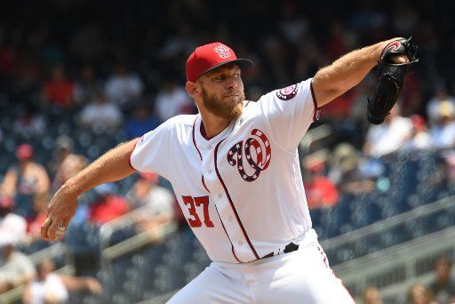 Washington Nationals Stephen Strasburg delivers a pitch in the first inning of game against the Los Angeles Dodgers at Nationals Park in Washington, DC on Sunday, July 28, 2019. Photo by Pat Benic\/