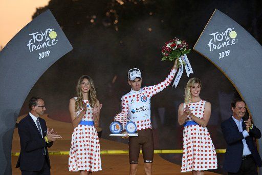 Romain Bardet of France attends the presentation ceremony after winning the polka dot jersey for "King of the Mountains" at the Tour de France in Paris on Sunday, July 28, 2019. Photo by David Silpa\/
