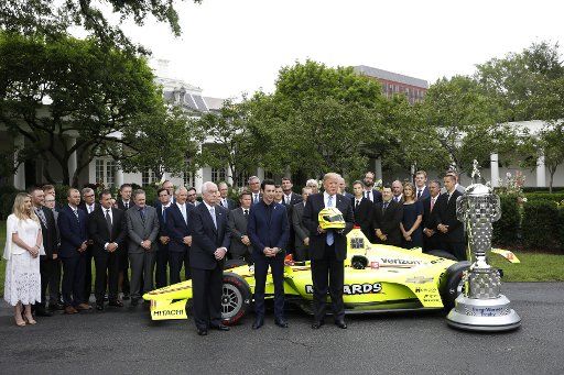 U.S. President Donald Trump greets Team Penske, the 103rd Indianapolis 500 Champions, on the South Lawn of the White House in Washington on June 10, 2019. Photo by Yuri Gripas\/