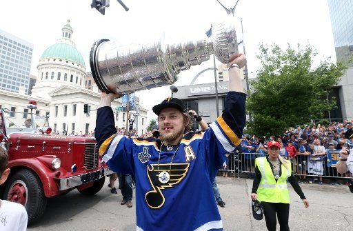 St. Louis Blues Vladimir Tarasenko pumps up the crowd holding up the Stanley Cup as he participates in the Stanley Cup Parade through the streets of St. Louis on June 15, 2019. Photo by Bill Greenblatt\/