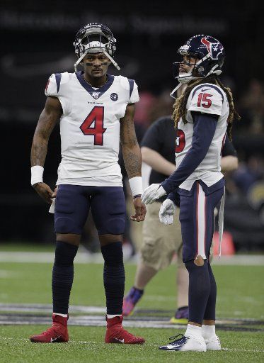 Houston Texans quarterback Deshaun Watson (4) and wide receiver Will Fuller chat before the game with the New Orleans Saints at the Louisiana Supedome in New Orleans on Monday, September 9, 2019. Photo by AJ Sisco\/