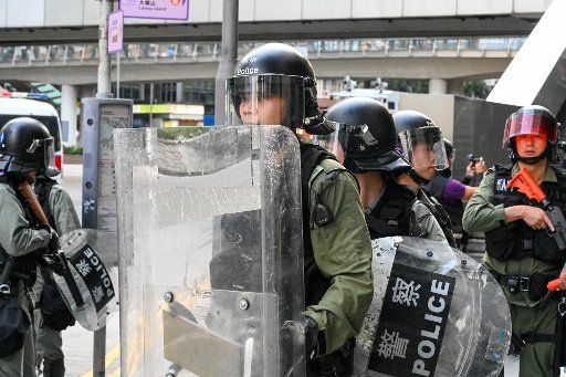 Riot police gather to disperse crowds at a rally in Hong Kong on Sunday, September 15, 2019 which saw clashes between protesters and law enforcement. Photo by Thomas Maresca\/