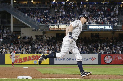 New York Yankees DJ LeMahieu hits a solo home run in the 2nd inning against the Los Angeles Angels at Yankee Stadium on Thursday, September 19, 2019 in New York City. Photo by John Angelillo\/