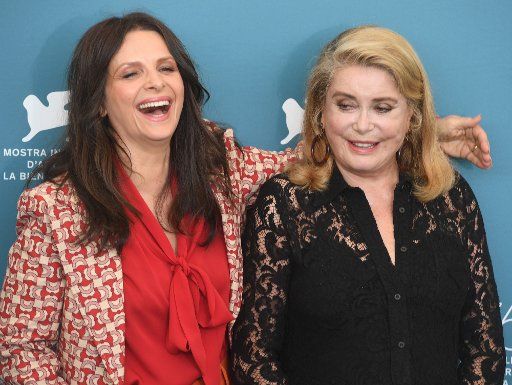 French actresses Catherine Deneuve and Juliette Binoche attend a photo call for The Truth at the 76th Venice Film Festival on August 28, 2019. Photo by Rune Hellestad\/