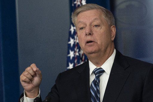 United States Senator Lindsey Graham, R-SC, speaks to reporters at the White House after President Donald Trump made a statement on the death of ISIS leader Abu Bakr al-Baghdadi, in Washington DC on October 27, 2019. Trump confirmed it was the ISIS leader killed along with others during a two-hour raid by U.S. special forces in Syria. Photo by Chris Kleponis\/