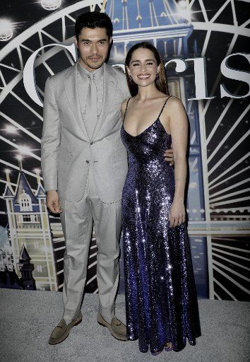 Actress Emilia Clarke (R) and actor Henry Golding attend the Premiere of the film \