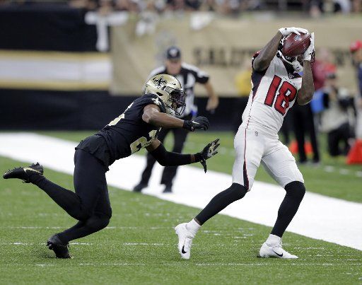 Atlanta Falcons wide receiver Calvin Ridley (18) snags a pass in front of New Orleans Saints cornerback Eli Apple (25) at the Mercedes-Benz Superdome in New Orleans on Sunday, November 10, 2019. Photo by AJ Sisco\/