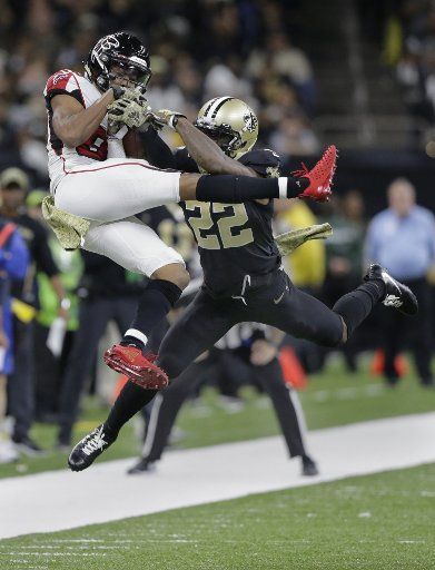 Atlanta Falcons wide receiver Russell Gage (83) has the ball knocked away by New Orleans Saints defensive back Chauncey Gardner-Johnson (22) at the Mercedes-Benz Superdome in New Orleans on Sunday, November 10, 2019. Photo by AJ Sisco\/