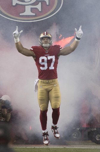 San Francisco 49ers defensive end Nick Bosa (97) is introduced before playing ther Green Bay Packers at Levi\