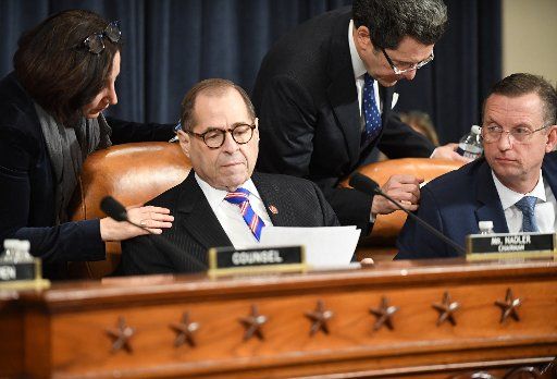 House Judiciary Committee chairman Jerry Nadler (D-NY) (L) and Rep. Doug Collins (R-GA) get last minute briefing before a hearing as part of the Donald Trump impeachment inquiry, on Capitol Hill, Wednesday, December 4, 2019, in Washington, DC. Photo by Pat Benic\/