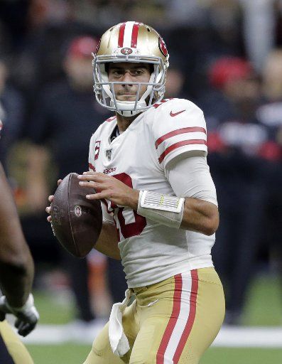 San Francisco 49ers quarterback Jimmy Garoppolo (10) throws against the New Orleans Saints at the Mercedes-Benz Superdome in New Orleans on Sunday, December 8, 2019. Photo by AJ Sisco\/