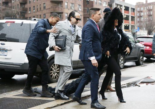 Cardi B arrives at Queens County Criminal Court in New York City on Tuesday, December 10, 2019. The 26-year-old is accused of throwing bottles and chairs at two bartenders at Angels Strip Club in Flushing back in August of 2018. Photo by John Angelillo\/