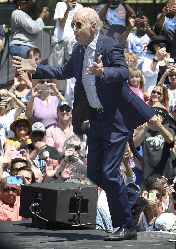 Former Vice President Joe Biden gestures as he arrives on stage for a kickoff campaign rally in Philadelphia, Pennsylvania, on May 18, 2019. The Democrat joins a field of 23 candidates in the 2020 presidential race against incumbent Republican President Donald Trump. Photo by Mike Theiler\/