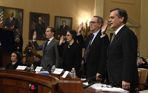 Law Professors (L-R) Noah Feldman, Pamela S. Karlan, Michael Gerhardt, and Jonathan Turley raise their right hands as they are sworn in to testify before the House Judiciary Committee, as part of the impeachment inquiry of President Donald Trump on Capitol Hill, on Wednesday, December 4, 2019, in Washington, DC. Photo by Mike Theiler\/