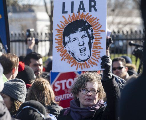 Members and supporters of the AFL-CIO labor union protest against President Donald Trump and the partial federal government shutdown in front of the White House in Washington, D.C., on January 10, 2019. Congress and President Trump remain at a budget stalemate. Photo by Pat Benic\/