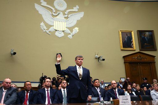 Acting National Intelligence Director Joseph Maguire takes the oath prior to testifying before the House Intelligence Committee at a hearing on Capitol Hill in Washington, D.C., on Thursday, September 26, 2019. Maguire discussed the whistleblower complaint of alleged misconduct by President Donald Trump in a July phone call with Ukraine\