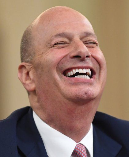Gordon Sondland, Ambassador to the European Union, laughs at a question about who was present at a meeting that never happened before the House Intelligence Committee Impeachment Hearings into President Donald Trump in Washington, D.C. on Wednesday, November 20, 2019. Photo by Pat Benic\/