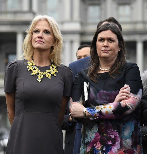 White House counselor Kellyanne Conway (L) and White House Press Secretary Sarah Huckabee Sanders listen to remarks by the GOP leadership after meeting with President Donald Trump and the Democratic leadership on the continuing government shutdown, in Washington, D.C., on January 9, 2019. Photo by Mike Theiler\/
