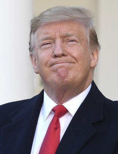 President Donald Trump pauses before making remarks in the Rose Garden of the White House, Washington, D.C., on January 25, 2019. Trump announced the administration had reached an agreement to re-open the government until mid-February as negotiations will continue on border security. Photo by Mike Theiler\/