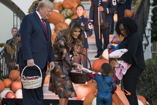 President Donald Trump and first lady Melania Trump participate in a Halloween celebration on the South Portico of the White House in Washington, D.C., on Monday, October 28, 2019. Photo by Sarah Silbiger\/