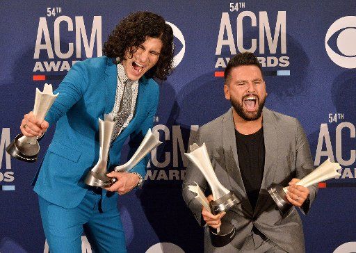 Dan + Shay, winners of the award for Duo of the Year, appear backstage at the 54th annual Academy of Country Music Awards held at the MGM Grand Garden Arena in Las Vegas, Nevada on April 7, 2019. Photo by Jim Ruymen\/