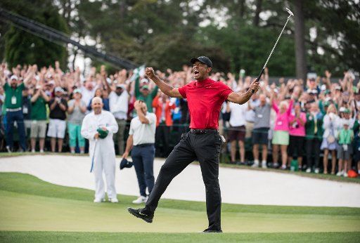 Tiger Woods celebrates after winning the 2019 Masters Tournament at Augusta National Golf Club in Augusta, Georgia, on April 14, 2019. Woods won the tournament 13-under-par. Photo by Kevin Dietsch\/