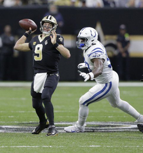 New Orleans Saints quarterback Drew Brees (9) throws against the \/Indianapolis Colts at the Mercedes-Benz Superdome in New Orleans on Sunday, December 16, 2019. Defending on the play is Indianapolis Colts defensive end Justin Houston (99). Photo by AJ Sisco\/