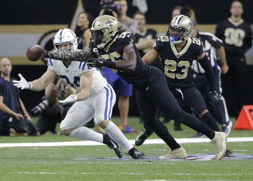New Orleans Saints outside linebacker Demario Davis (56) knocks the ball away from at the Mercedes-Benz Superdome in New Orleans on Monday, December 16, 2019. Photo by AJ Sisco\/