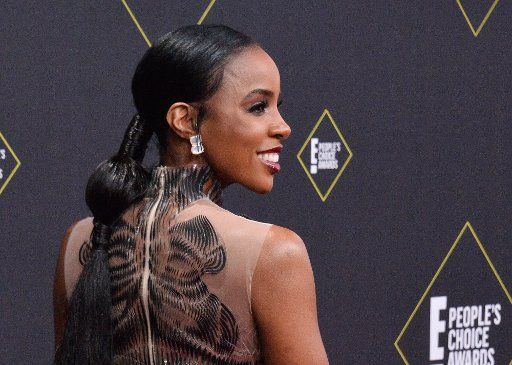 Singer Kelly Rowland arrives for the 45th annual E! People\