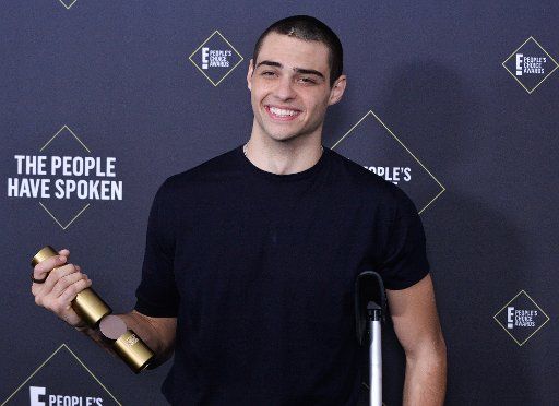 Noah Centineo appears backstage with his award for Comedy Movie Star of 2019 during the 45th annual E! People\