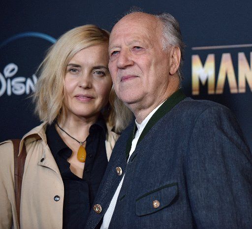 Director Werner Herzog (R) and his wife Lena Herzog arrive for the premiere of Disney+\