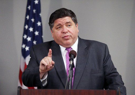 Illinois Gov. J.B. Pritzker gives an update to reporters on the statewide response to Coronavirus in Belleville, Illinois on Wednesday, March 18, 2020. 60 Illinois National Guard members are now deployed to help as the number of those with the virus reaches 160 cases in 15 counties with one death. Photo by Bill Greenblatt\/