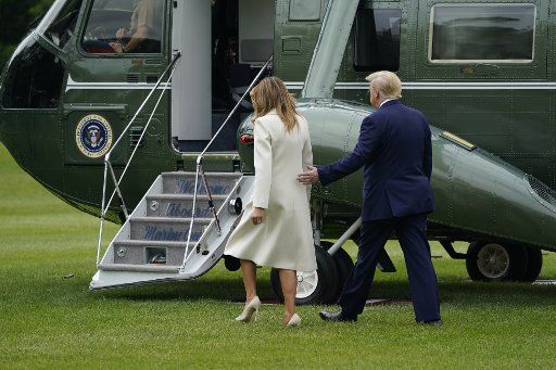United States President Donald Trump and First Lady Melania Trump depart the White House en route to Arlington National Cemetery to celebrate Memorial Day by participating in a wreath laying ceremony in Arlington, Virginia on Monday, May 25, 2020. Photo by Chris Kleponis\/